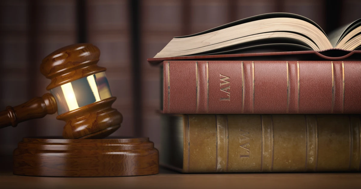 Law Books and Gavel on a Wooden Desk