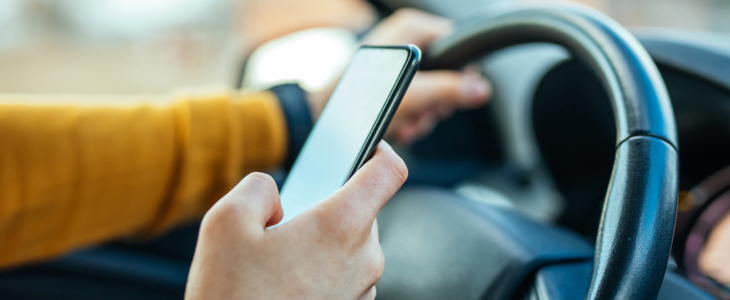 distracted driving accident - Driver looking at cell phone