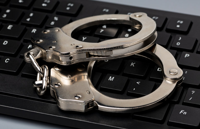 handcuffs on keyboard
