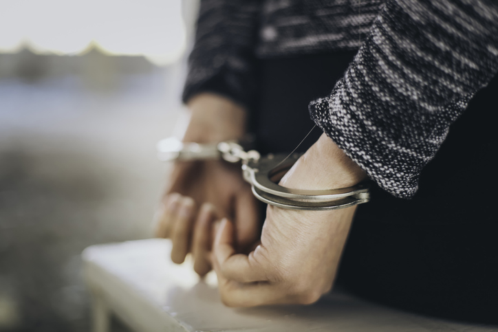 Woman in handcuffs
